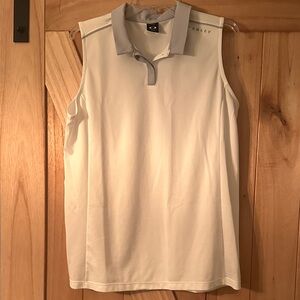 Oakley white and grey Sleeveless shirt golf or tennis top.
